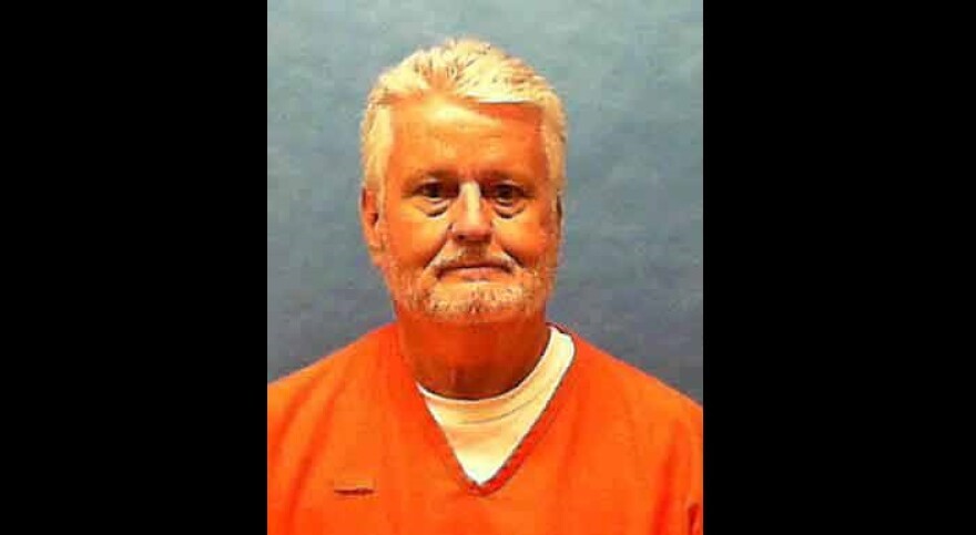 Portrait of death row inmate Bobby Joe Long in prison uniform