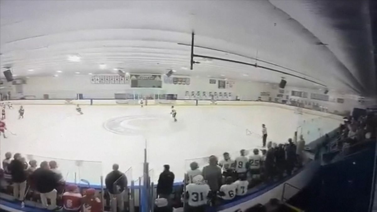 Wide view of Dennis M. Lynch Arena during a game, showing stands and ice surface